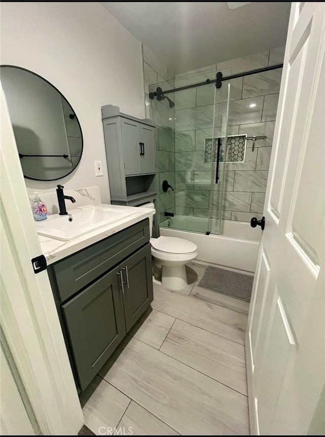 1303 W 109th Pl, Los Angeles, CA 90044 - full bath featuring vanity, enclosed tub / shower combo, and marble finish floors