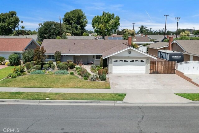 2692 N Fernside St, Orange, CA 92865 - single story home with a garage, concrete driveway, and a residential view