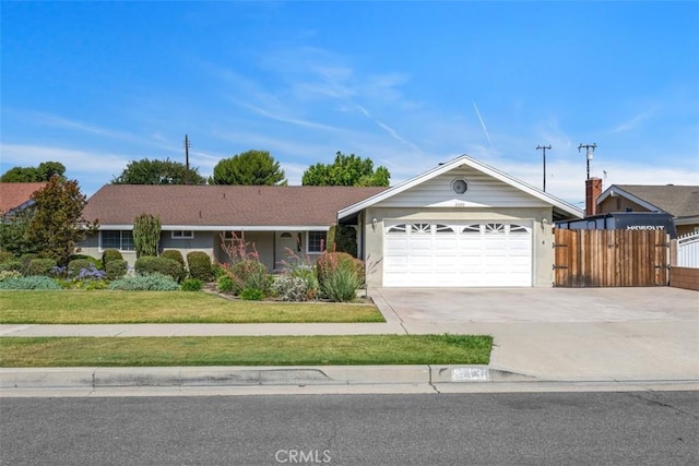 2692 N Fernside St, Orange, CA 92865 - ranch-style house with concrete driveway and an attached garage