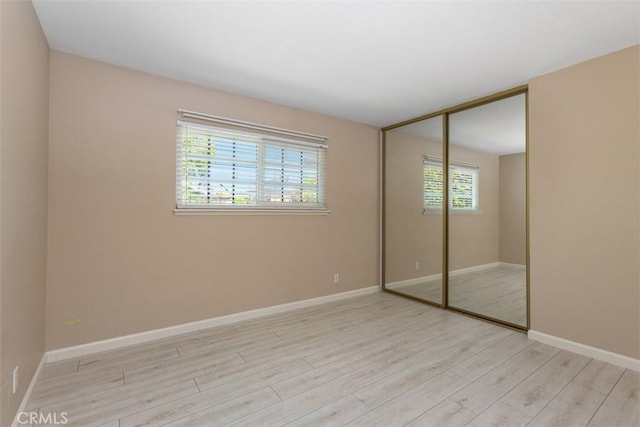 2692 N Fernside St, Orange, CA 92865 - unfurnished bedroom with a closet and wood finished floors