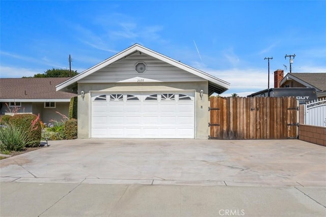 2692 N Fernside St, Orange, CA 92865 - ranch-style home with concrete driveway, a garage, and stucco siding