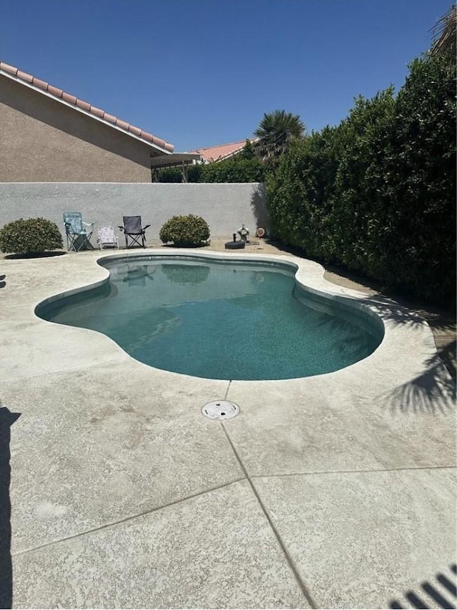 33878 Drifting Sands Cir, Thousand Palms, CA 92276 - view of swimming pool featuring a patio