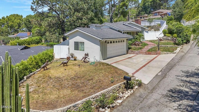 2302 Jayma Ln, La Crescenta, CA 91214 - ranch-style house featuring a tile roof, driveway, an attached garage, and stucco siding