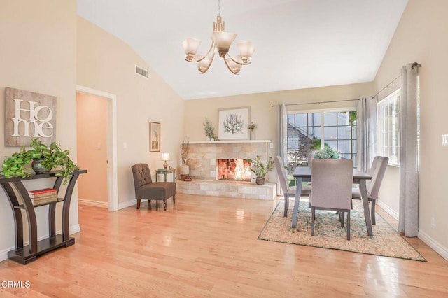 2302 Jayma Ln, La Crescenta, CA 91214 - dining area featuring lofted ceiling, a chandelier, and wood finished floors