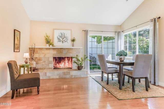 2302 Jayma Ln, La Crescenta, CA 91214 - dining area featuring wood finished floors, lofted ceiling, and a fireplace