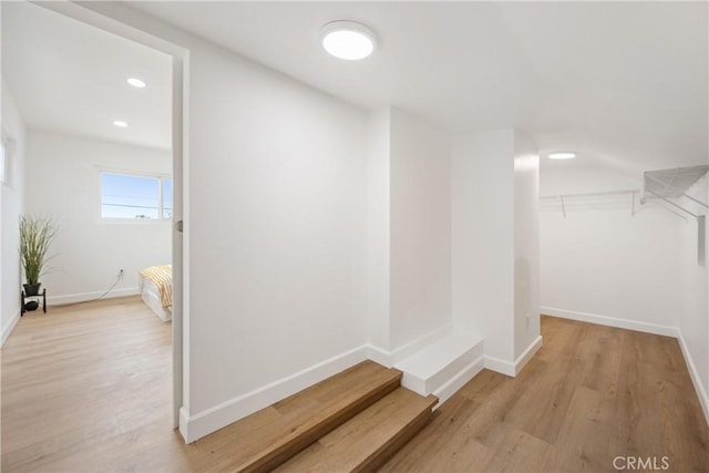 239 N Basilio Ave, San Dimas, CA 91773 - corridor featuring light wood finished floors and recessed lighting