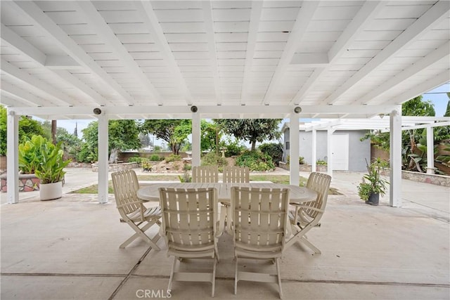 239 N Basilio Ave, San Dimas, CA 91773 - view of patio with outdoor dining area and a storage shed