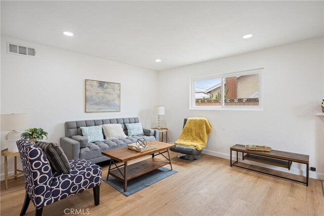 239 N Basilio Ave, San Dimas, CA 91773 - living area featuring light wood-style flooring and recessed lighting