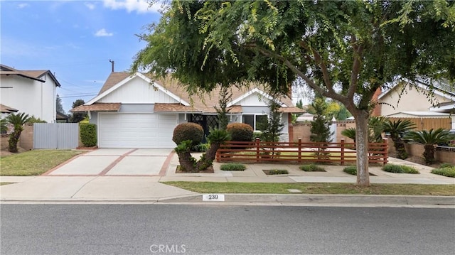 239 N Basilio Ave, San Dimas, CA 91773 - view of front of property featuring driveway and an attached garage