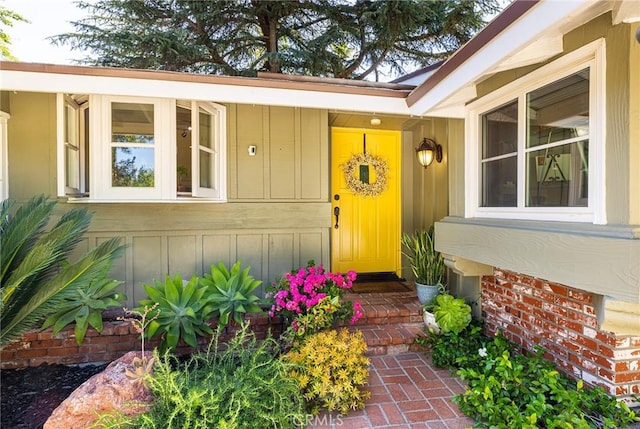 8841 White Oak Ave, Sherwood Forest, CA 91325 - doorway to property with board and batten siding