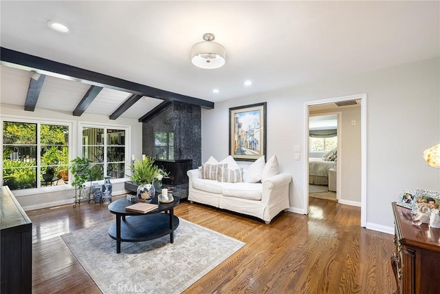 8841 White Oak Ave, Sherwood Forest, CA 91325 - living area featuring wood finished floors and recessed lighting
