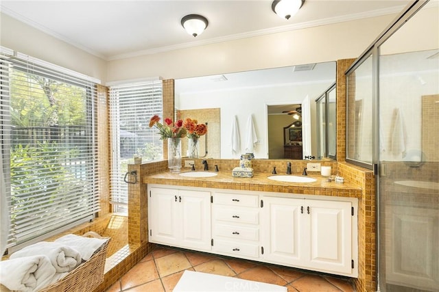 8841 White Oak Ave, Sherwood Forest, CA 91325 - full bath featuring double vanity, crown molding, tile patterned floors, an enclosed shower, and ceiling fan