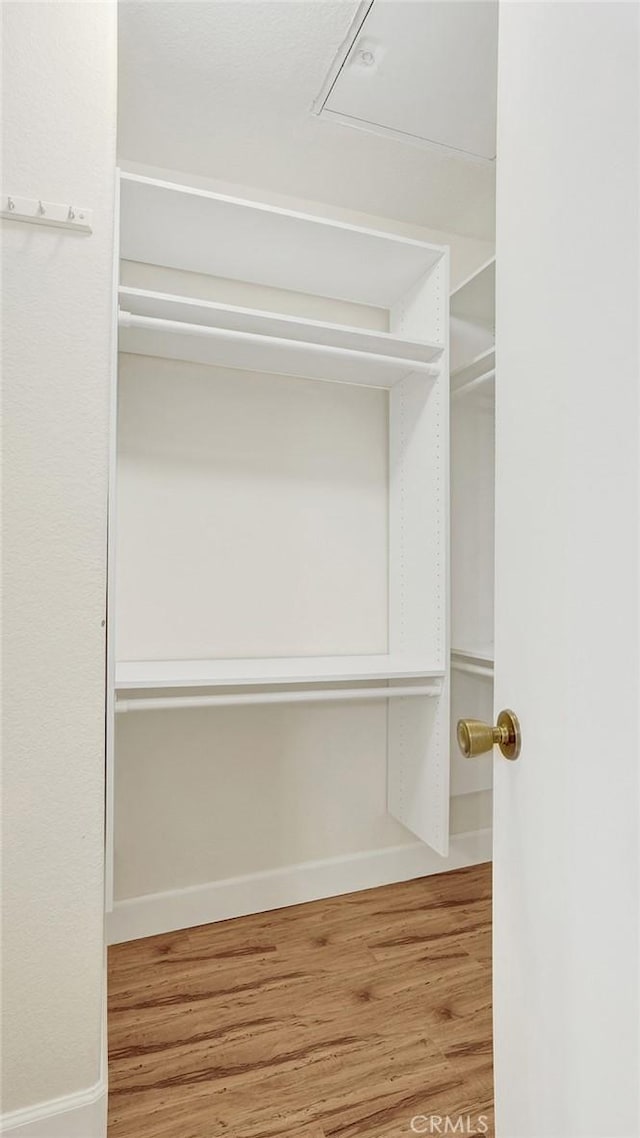 13133 Le Parc Unit 503, Chino Hills, CA 91709 - spacious closet with wood finished floors