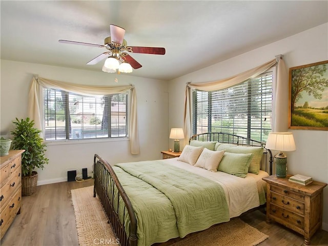 1023 Fremont St, Calimesa, CA 92320 - bedroom featuring light wood finished floors and a ceiling fan
