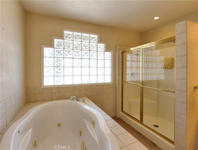 1023 Fremont St, Calimesa, CA 92320 - bathroom featuring plenty of natural light, a whirlpool tub, and a stall shower
