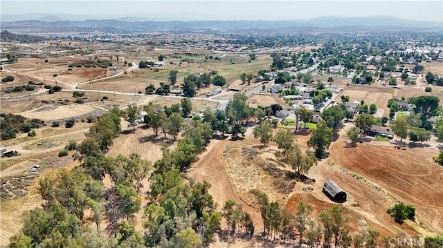 1023 Fremont St, Calimesa, CA 92320 - aerial view of property and surrounding area with a mountain backdrop and rural landscape