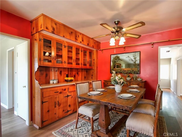 1023 Fremont St, Calimesa, CA 92320 - dining space with light wood-style flooring and a ceiling fan