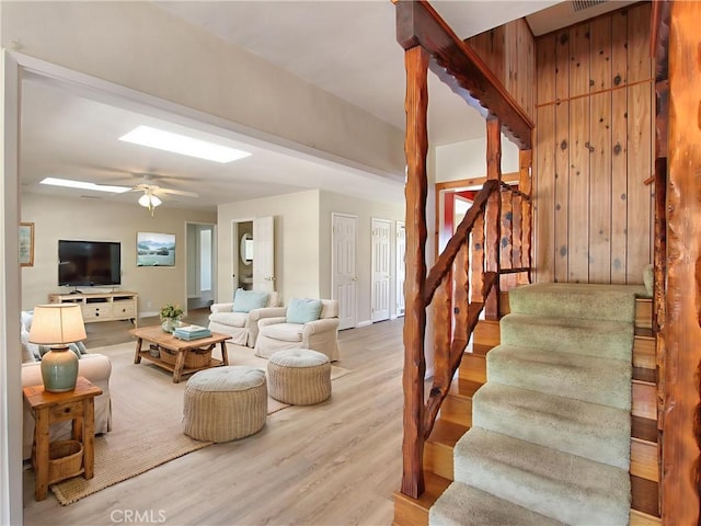 1023 Fremont St, Calimesa, CA 92320 - living room featuring stairs, wood finished floors, and ceiling fan
