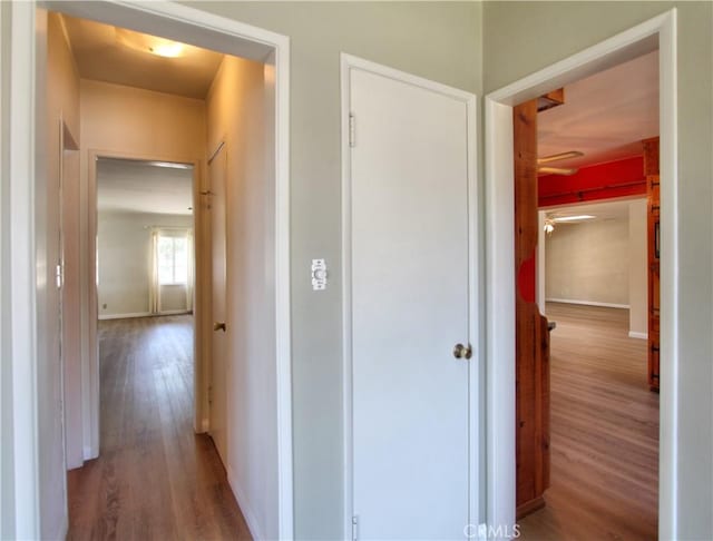 1023 Fremont St, Calimesa, CA 92320 - hallway with wood finished floors and baseboards