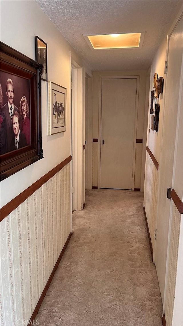 14020 Avion Dr, La Mirada, CA 90638 - hallway with carpet and a textured ceiling
