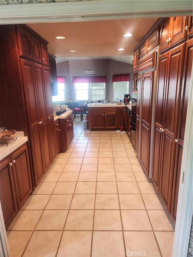 3082 Copa De Oro Dr, Los Alamitos, CA 90720 - kitchen featuring tile countertops, light tile patterned flooring, and wallpapered walls
