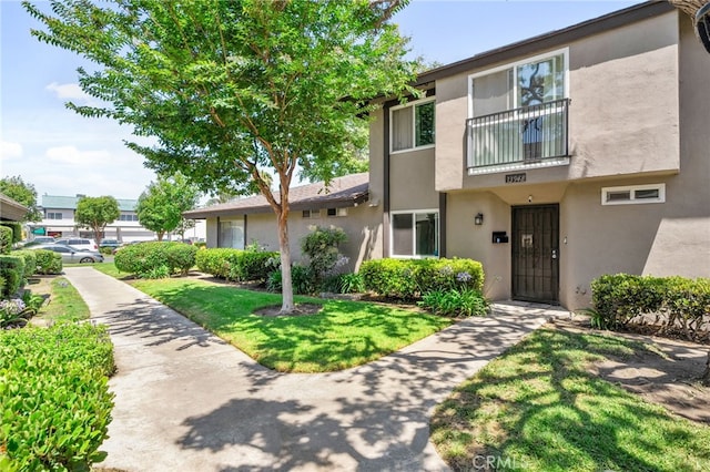 13948 Dawson St, Garden Grove, CA 92843 - multi unit property featuring stucco siding and a front lawn