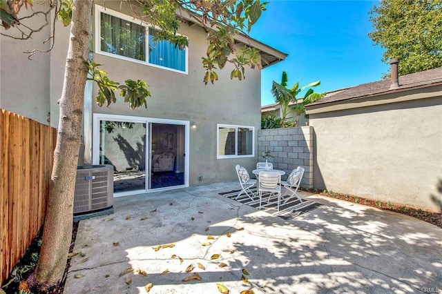13948 Dawson St, Garden Grove, CA 92843 - back of property with stucco siding, a patio, and outdoor dining area