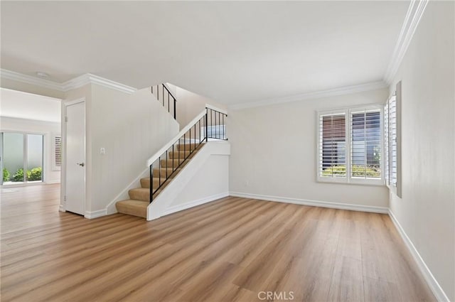 1984 Mount Shasta Dr, San Pedro, CA 90732 - unfurnished living room featuring wood finished floors, plenty of natural light, stairway, and ornamental molding