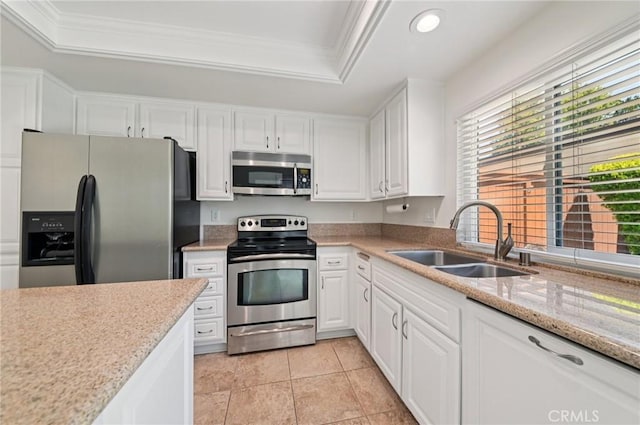 1984 Mount Shasta Dr, San Pedro, CA 90732 - kitchen featuring appliances with stainless steel finishes, a raised ceiling, white cabinetry, recessed lighting, and ornamental molding