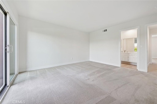 1984 Mount Shasta Dr, San Pedro, CA 90732 - unfurnished bedroom featuring light colored carpet and ensuite bathroom