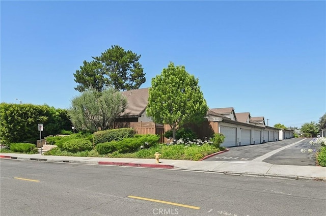 1984 Mount Shasta Dr, San Pedro, CA 90732 - view of property hidden behind natural elements with community garages and uncovered parking