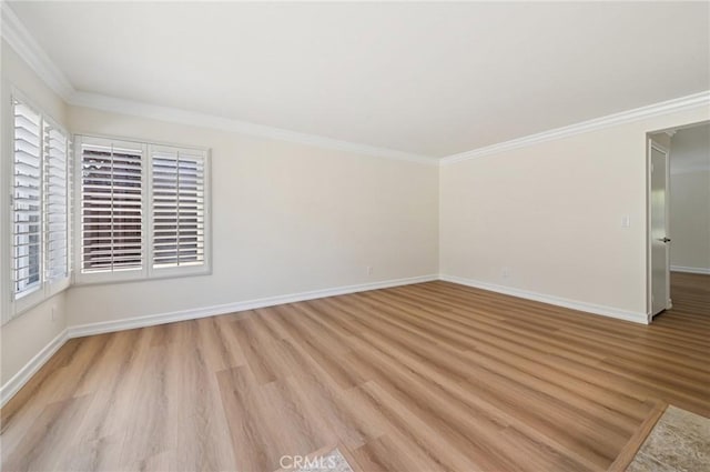 1984 Mount Shasta Dr, San Pedro, CA 90732 - spare room featuring healthy amount of natural light, light wood-style flooring, and ornamental molding