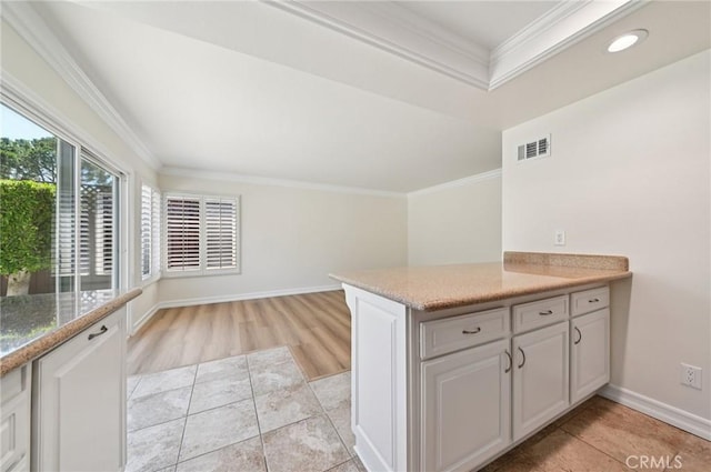 1984 Mount Shasta Dr, San Pedro, CA 90732 - kitchen featuring crown molding, a peninsula, recessed lighting, white cabinetry, and light stone countertops
