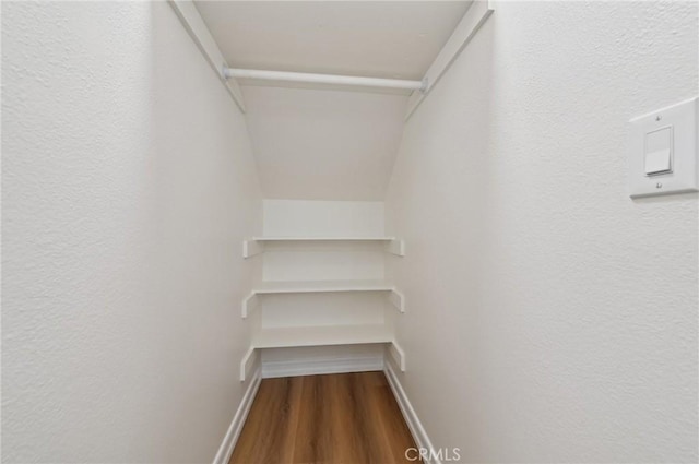 1984 Mount Shasta Dr, San Pedro, CA 90732 - walk in closet featuring wood finished floors