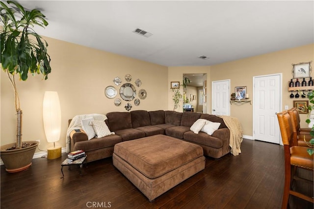 45749 21st St W, Lancaster, CA 93536 - living room with dark wood-type flooring and baseboards