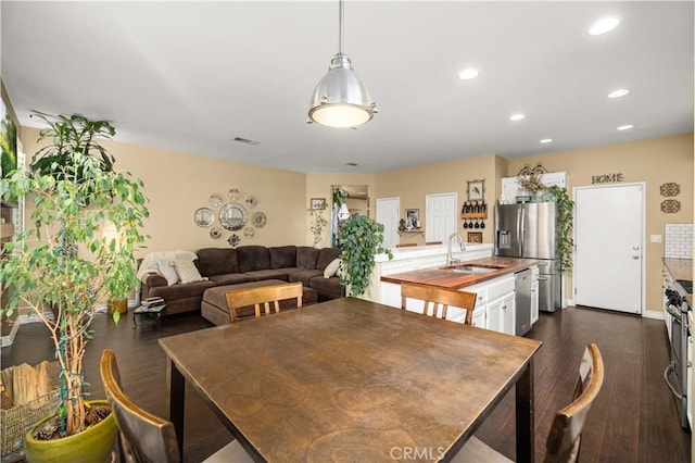 45749 21st St W, Lancaster, CA 93536 - dining space with dark wood finished floors and recessed lighting