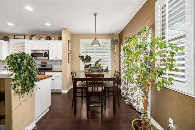 45749 21st St W, Lancaster, CA 93536 - dining space with dark wood-style flooring and recessed lighting