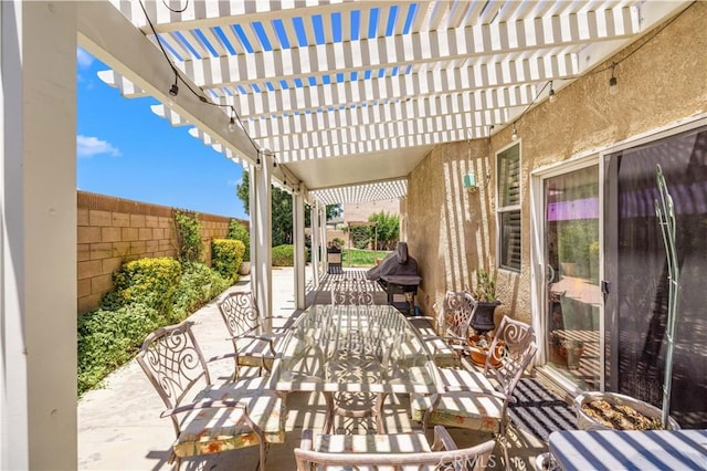 45749 21st St W, Lancaster, CA 93536 - fenced backyard with a patio area, outdoor dining space, and a pergola