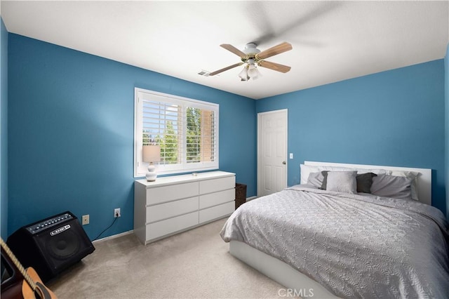 45749 21st St W, Lancaster, CA 93536 - carpeted bedroom with baseboards and a ceiling fan
