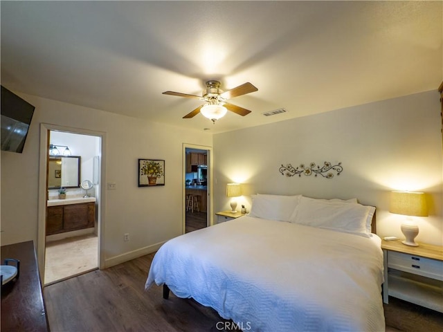 42179 High Point Ct, Ahwahnee, CA 93601 - bedroom with wood finished floors, ensuite bathroom, and ceiling fan