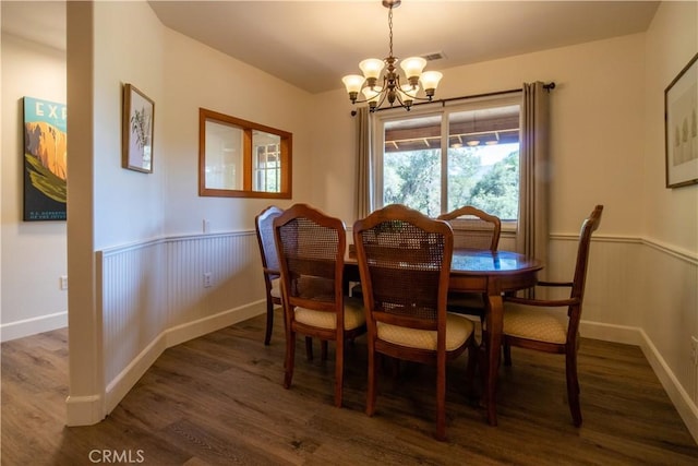 42179 High Point Ct, Ahwahnee, CA 93601 - dining room with a chandelier, wood finished floors, and a wainscoted wall