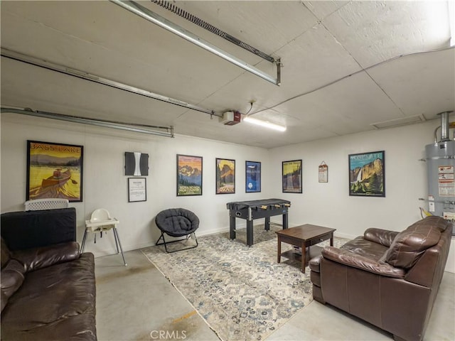 42179 High Point Ct, Ahwahnee, CA 93601 - living area with concrete flooring and strapped water heater