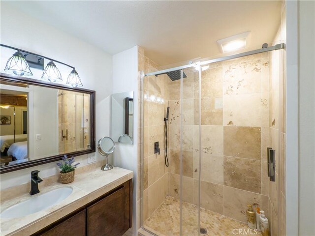 42179 High Point Ct, Ahwahnee, CA 93601 - full bathroom with vanity, ensuite bath, and a shower stall