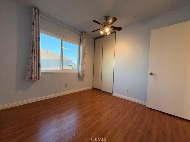 22407 Birds Eye Dr, Diamond Bar, CA 91765 - unfurnished bedroom featuring wood finished floors, ceiling fan, and a closet