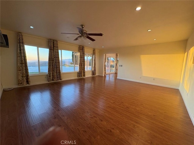 22407 Birds Eye Dr, Diamond Bar, CA 91765 - unfurnished living room with plenty of natural light, wood finished floors, a ceiling fan, recessed lighting, and a water view