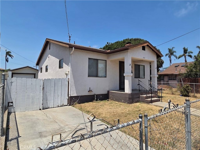 521 E 7th St, National City, CA 91950 - view of front facade featuring a gate and stucco siding