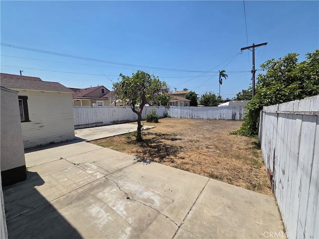 521 E 7th St, National City, CA 91950 - fenced backyard featuring a patio