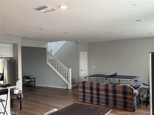 7453 Grazing Ln, Riverside, CA 92507 - living room featuring wood finished floors and stairs