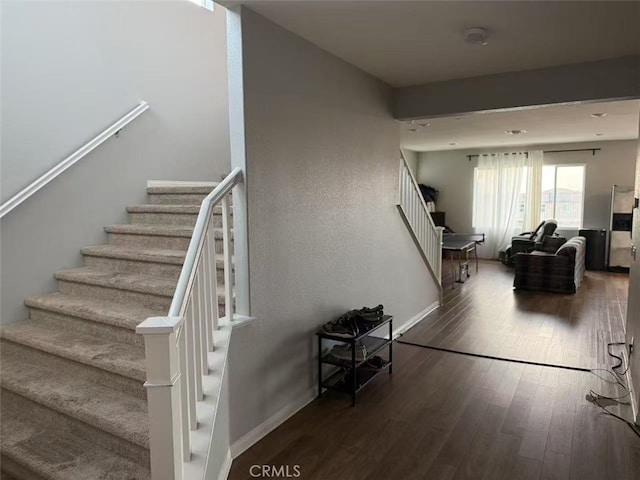 7453 Grazing Ln, Riverside, CA 92507 - staircase featuring wood finished floors and baseboards