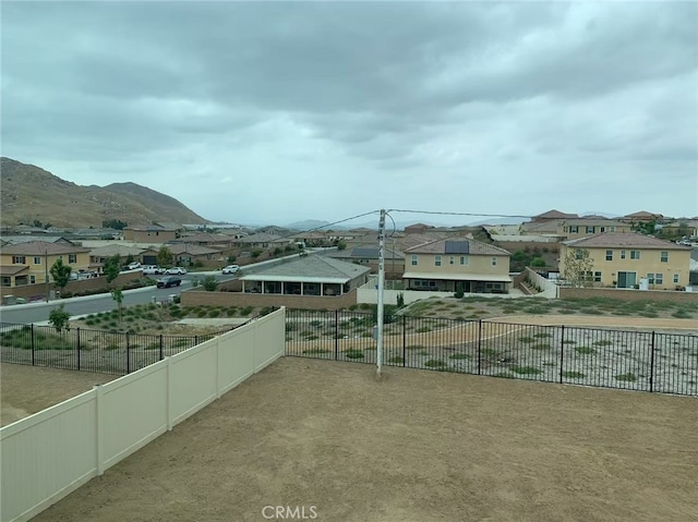 7453 Grazing Ln, Riverside, CA 92507 - fenced backyard with a residential view and a mountain view